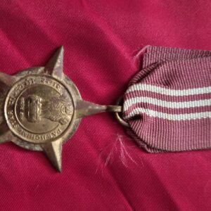 Indian Army Paschimi Star named campaign medal with maroon and white striped ribbon.