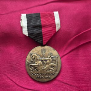 US Navy Occupation Service Medal with a trident and sea creature motif.