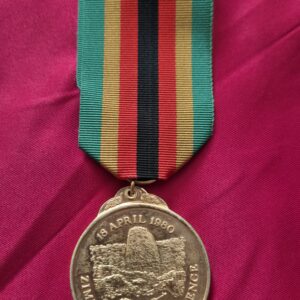 Zimbabwe Independence Medal from 1980 with a striped ribbon.