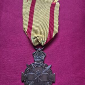 A Greek military medal with a crown and crossed swords.