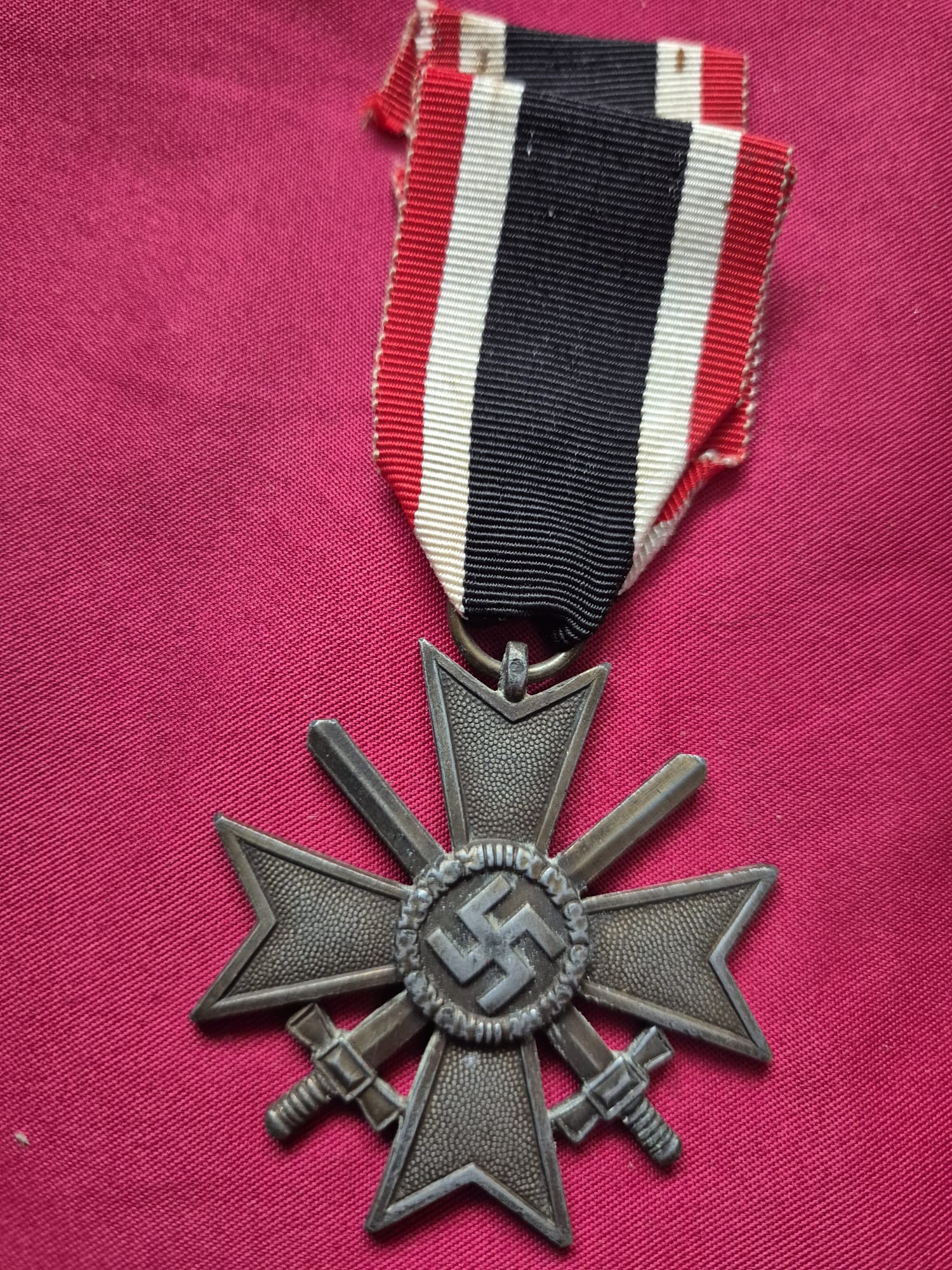 A Second Class War Merit Cross with Swords and ribbon.