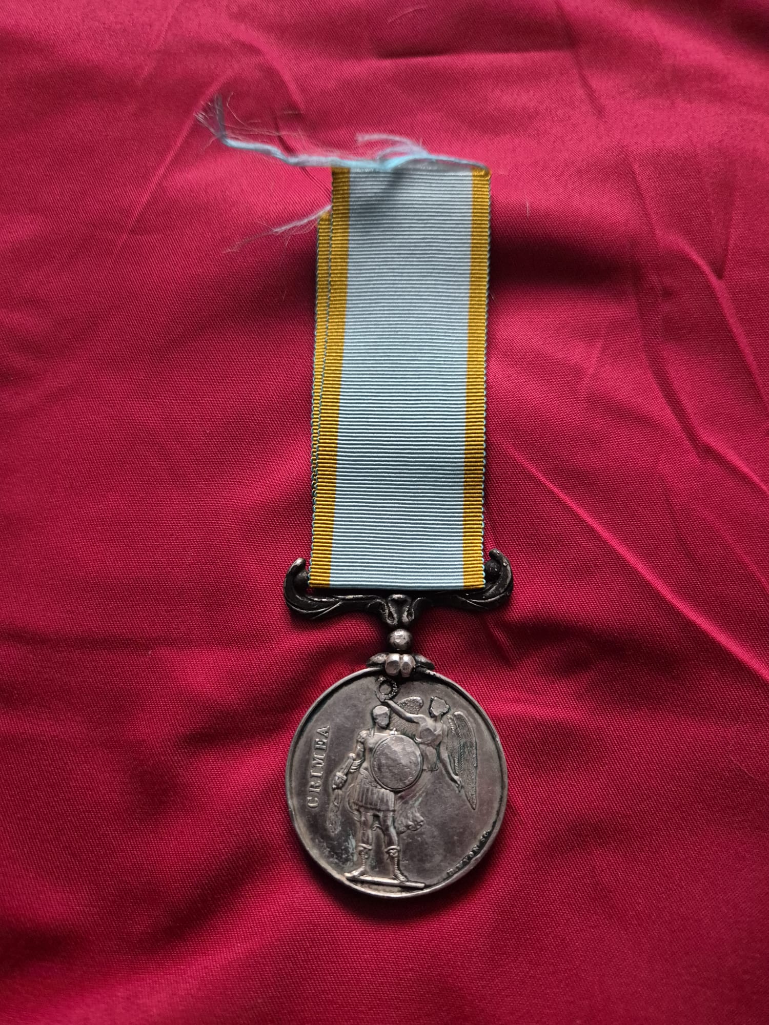 A Victorian-era Crimea Medal with Queen Victoria's effigy.