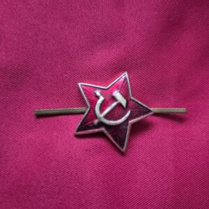 Vintage Soviet Red Army enamel hat badge with hammer and sickle.