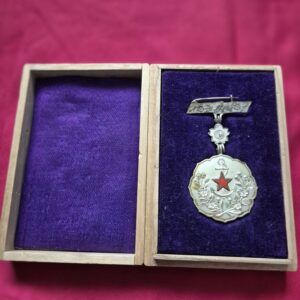 WWII Japanese Patriotic Women's Association Merit Badge with red star.